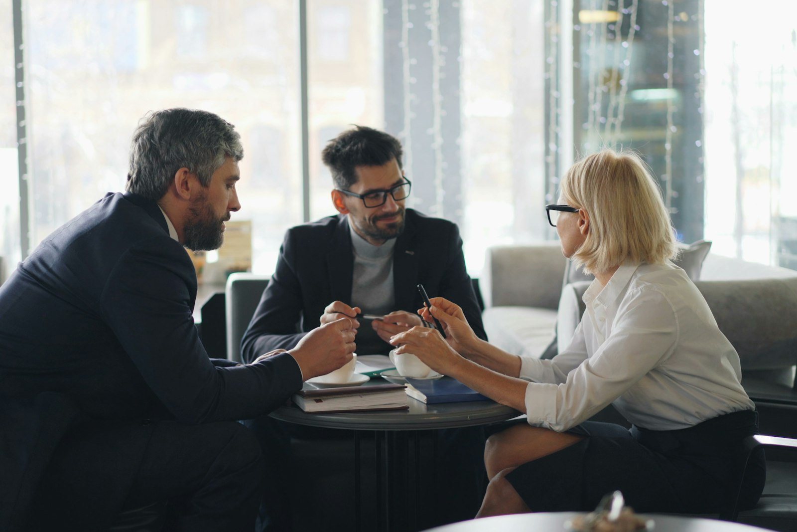 A group of people in a meeting